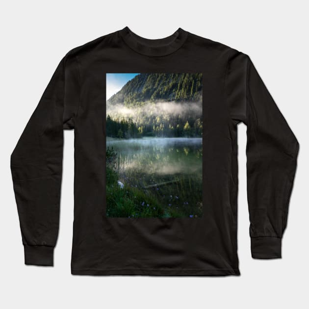 Fog cloud over lake, Flowers in Front. Amazing shot of the Ferchensee lake in Bavaria, Germany. Scenic foggy morning scenery at sunrise with mountain in the back. Long Sleeve T-Shirt by EviRadauscher